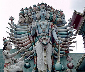 Lord Krishna displays his Vishvarupa (Universa...